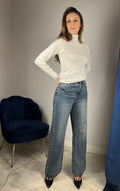 Jeans con borchie