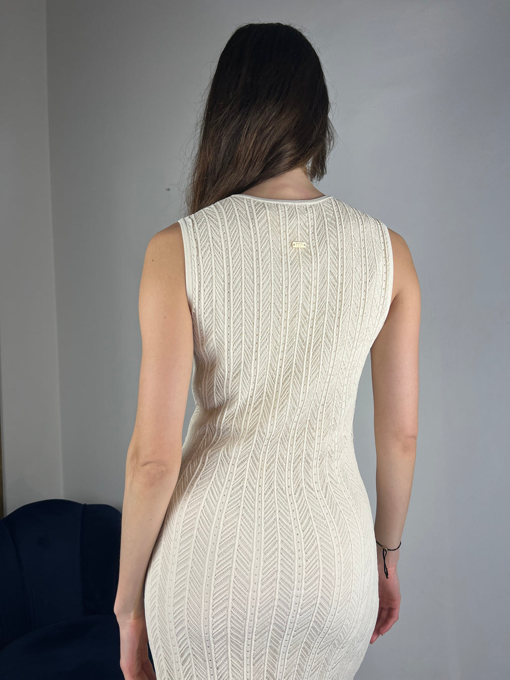Abito smanicato in maglia traforata
