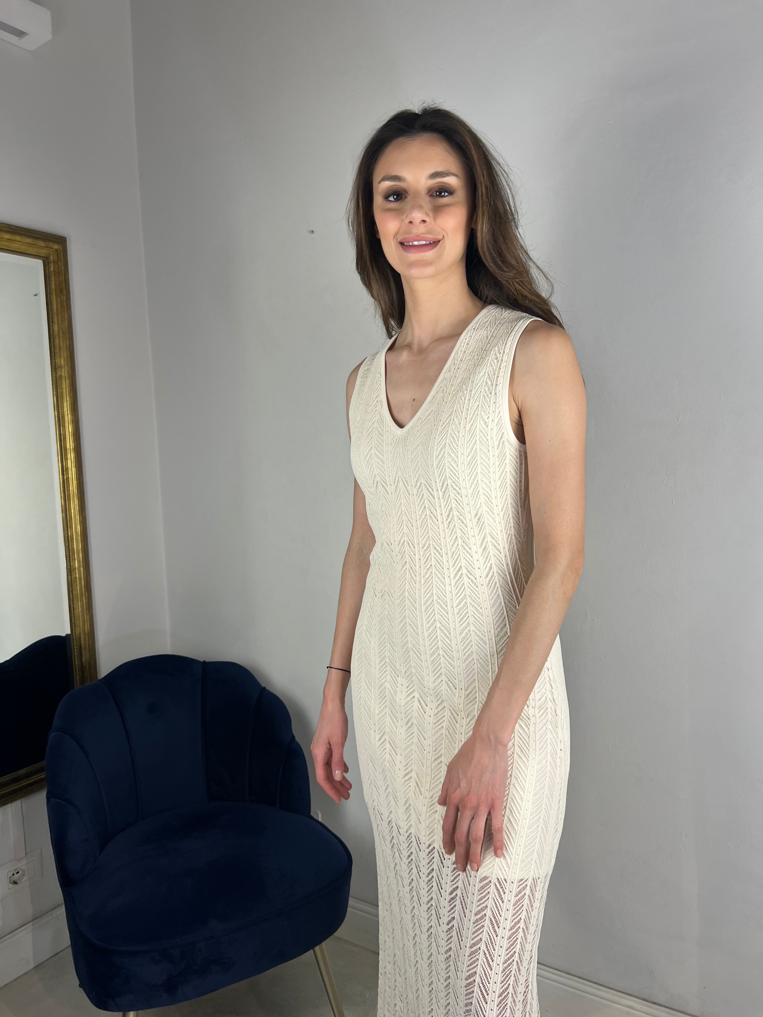 Abito smanicato in maglia traforata
