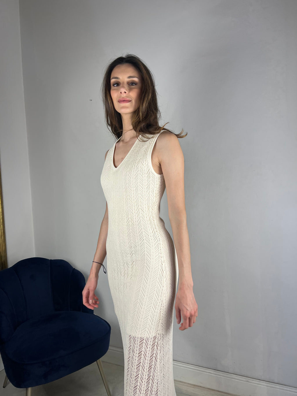 Abito smanicato in maglia traforata