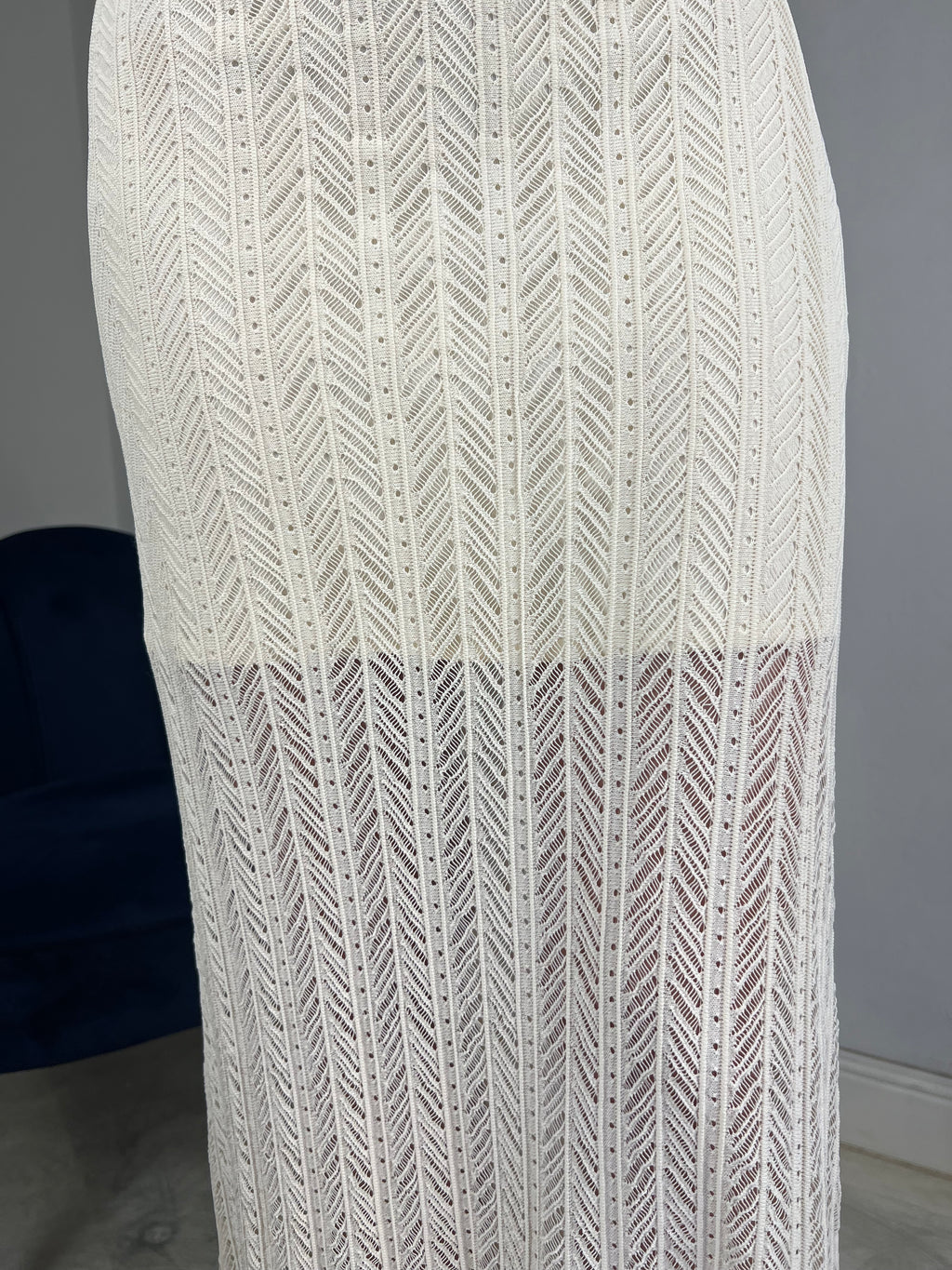 Abito smanicato in maglia traforata