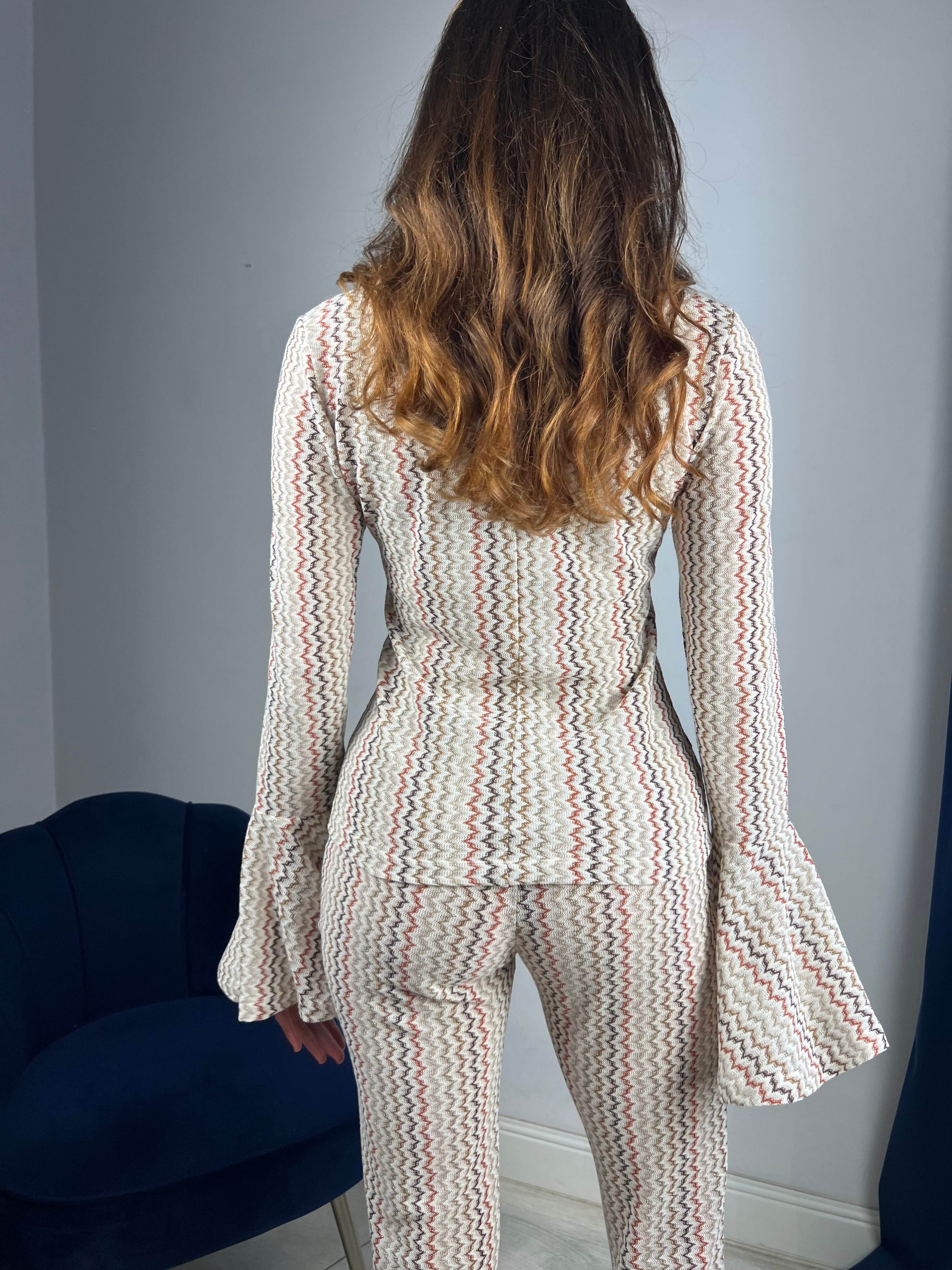 Pantalone a zampa completo