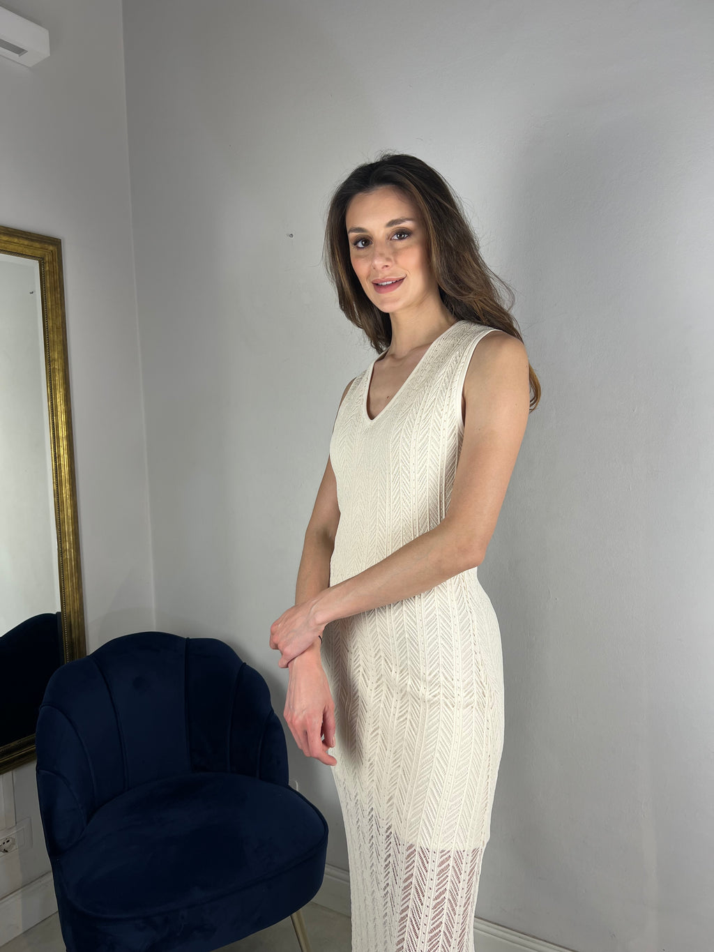 Abito smanicato in maglia traforata