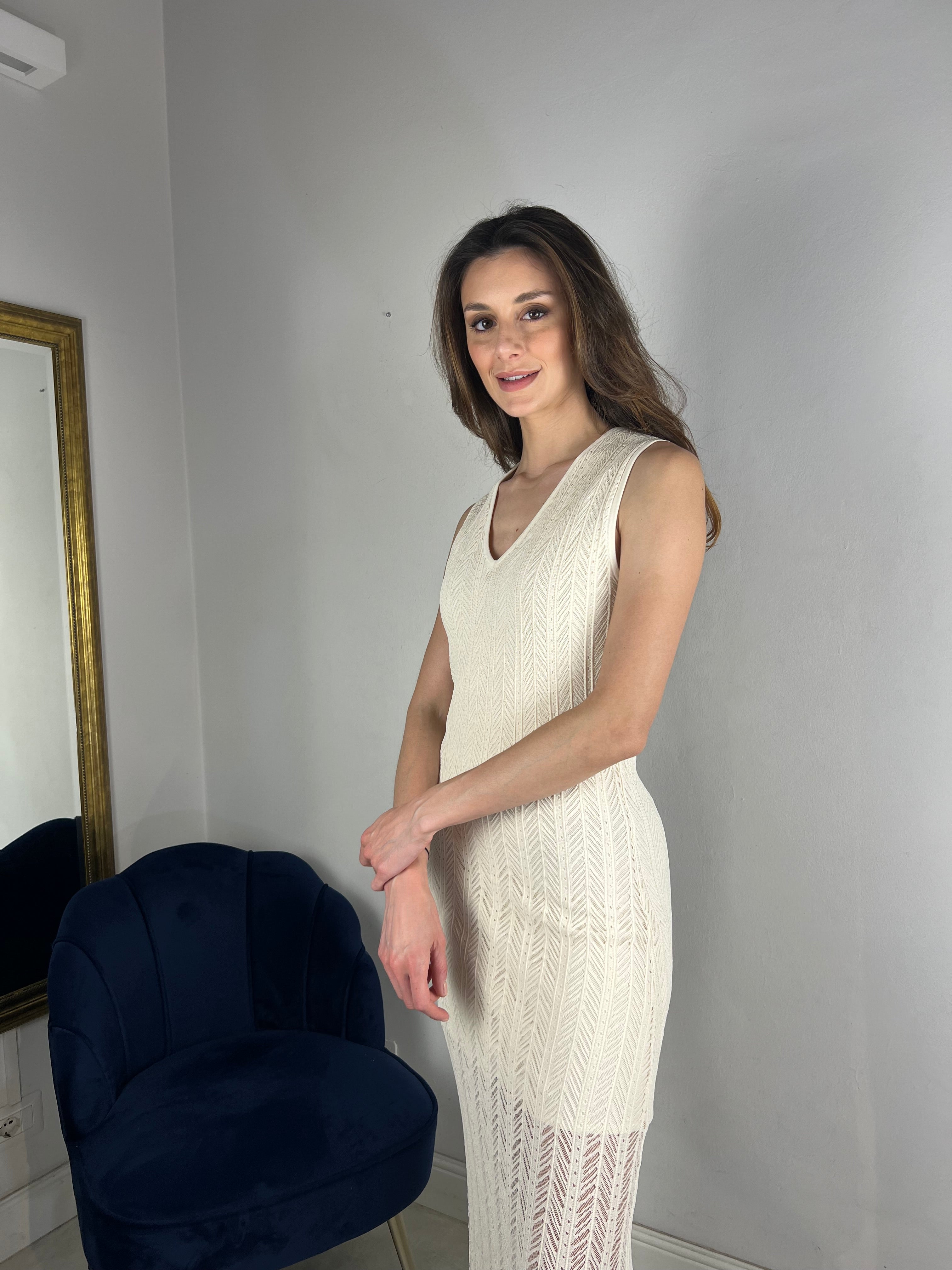 Abito smanicato in maglia traforata